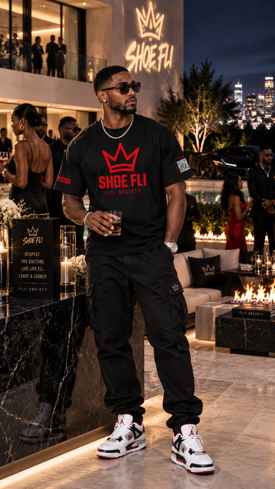 Male model wearing the Shoe Fli Movement Tee at a luxury event